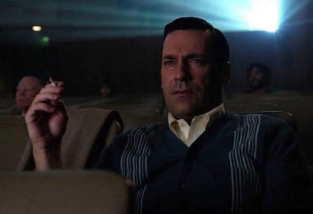 Don Draper watching a movie