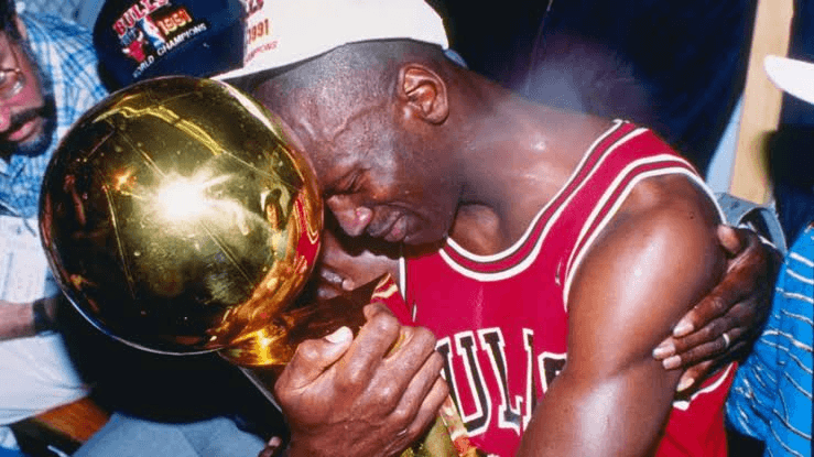 MJ crying with trophy