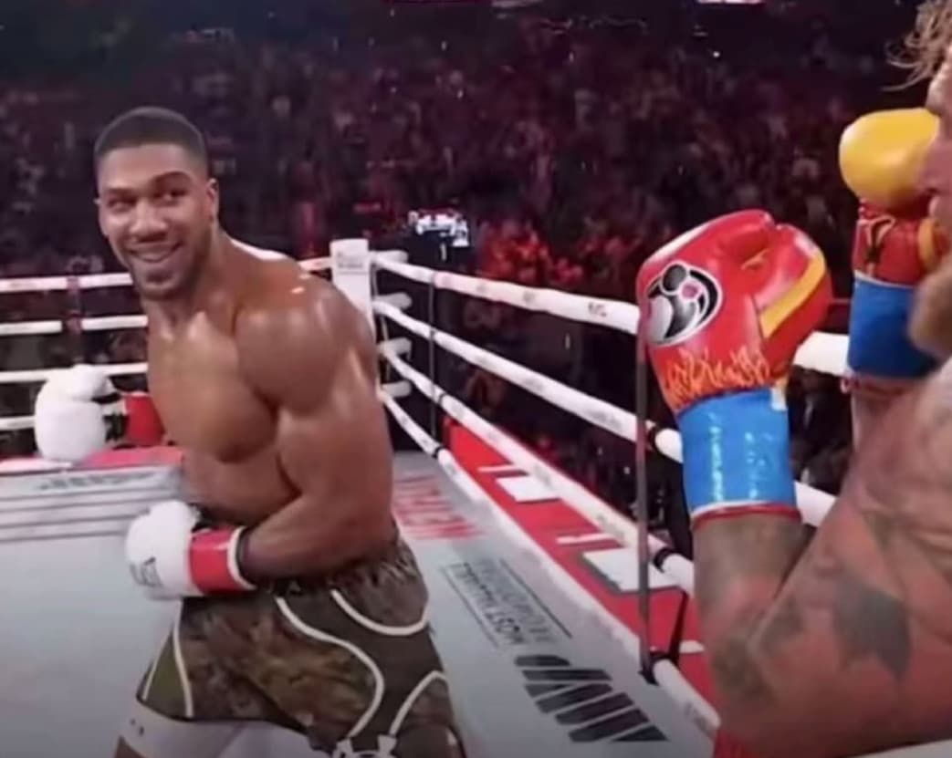 Anthony Joshua punching Jake Paul