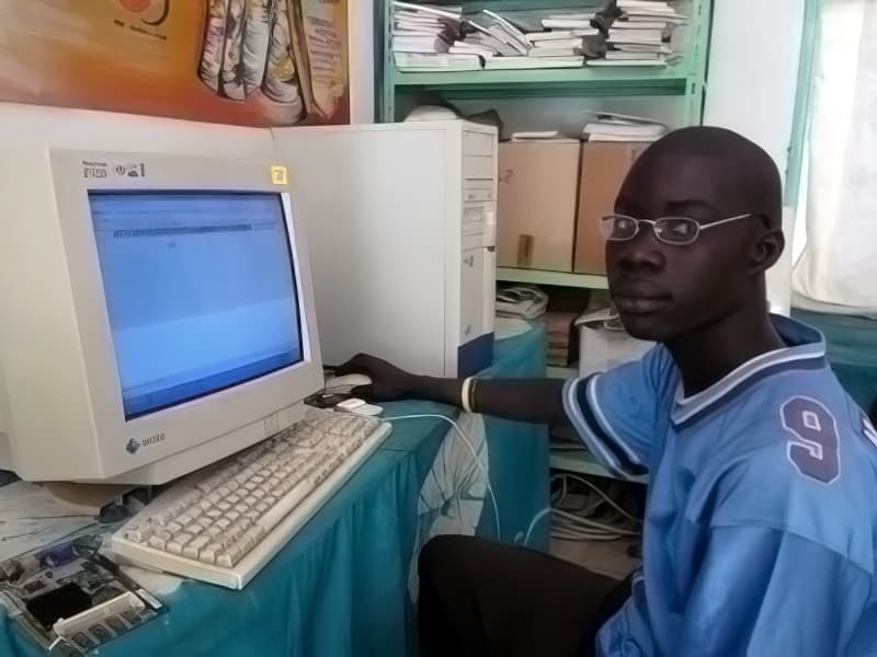 Guy pointing at computer screen