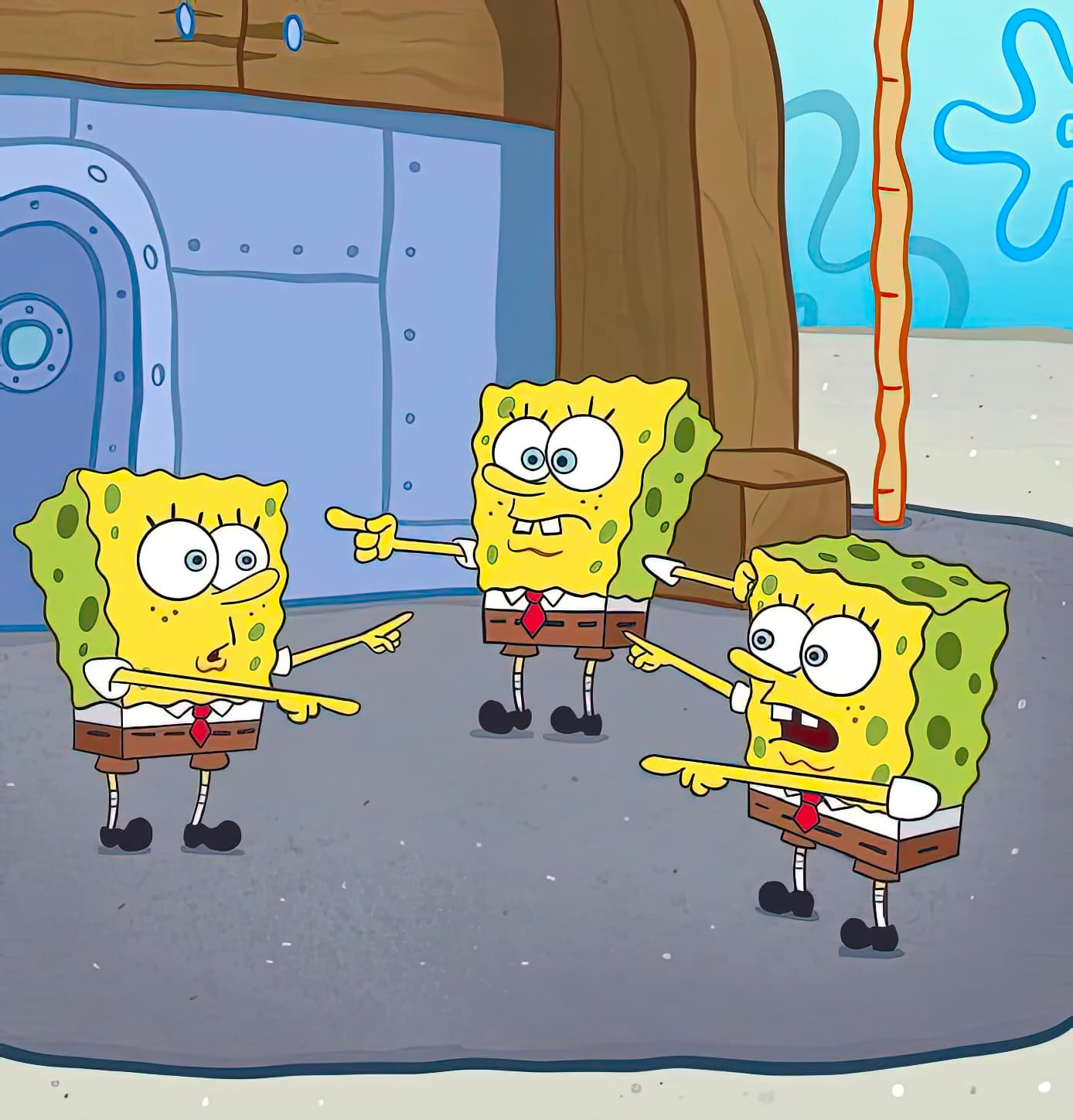 SpongeBob pointing at each other