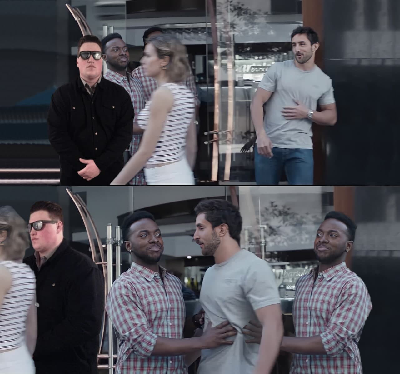 Guy blocking guy from girl