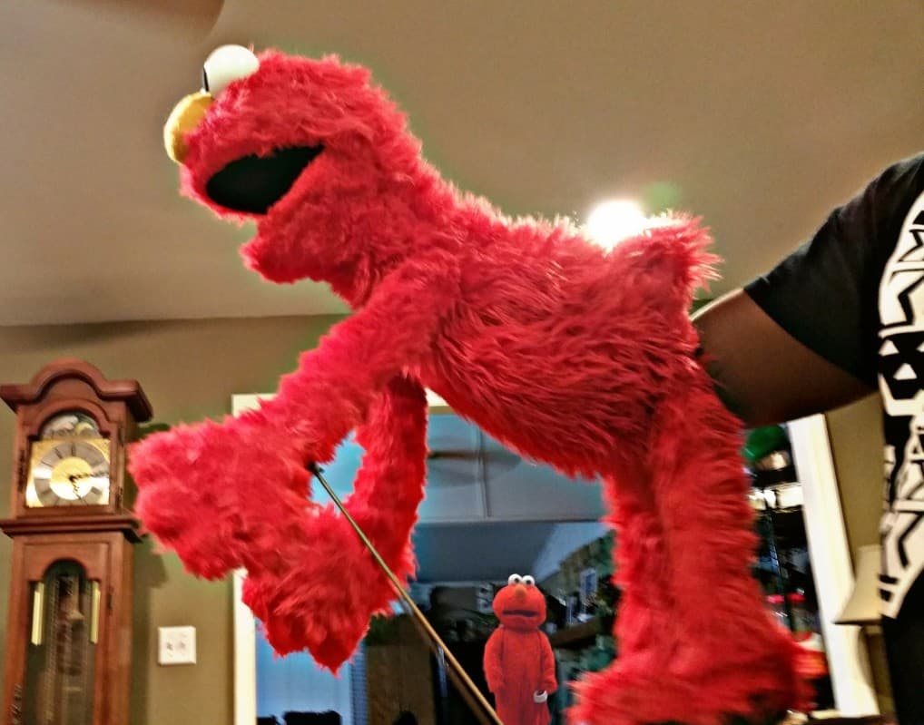 Elmo puppet hand inside