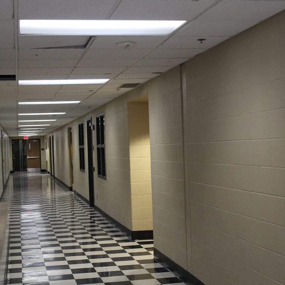 Floating boy chasing hallway