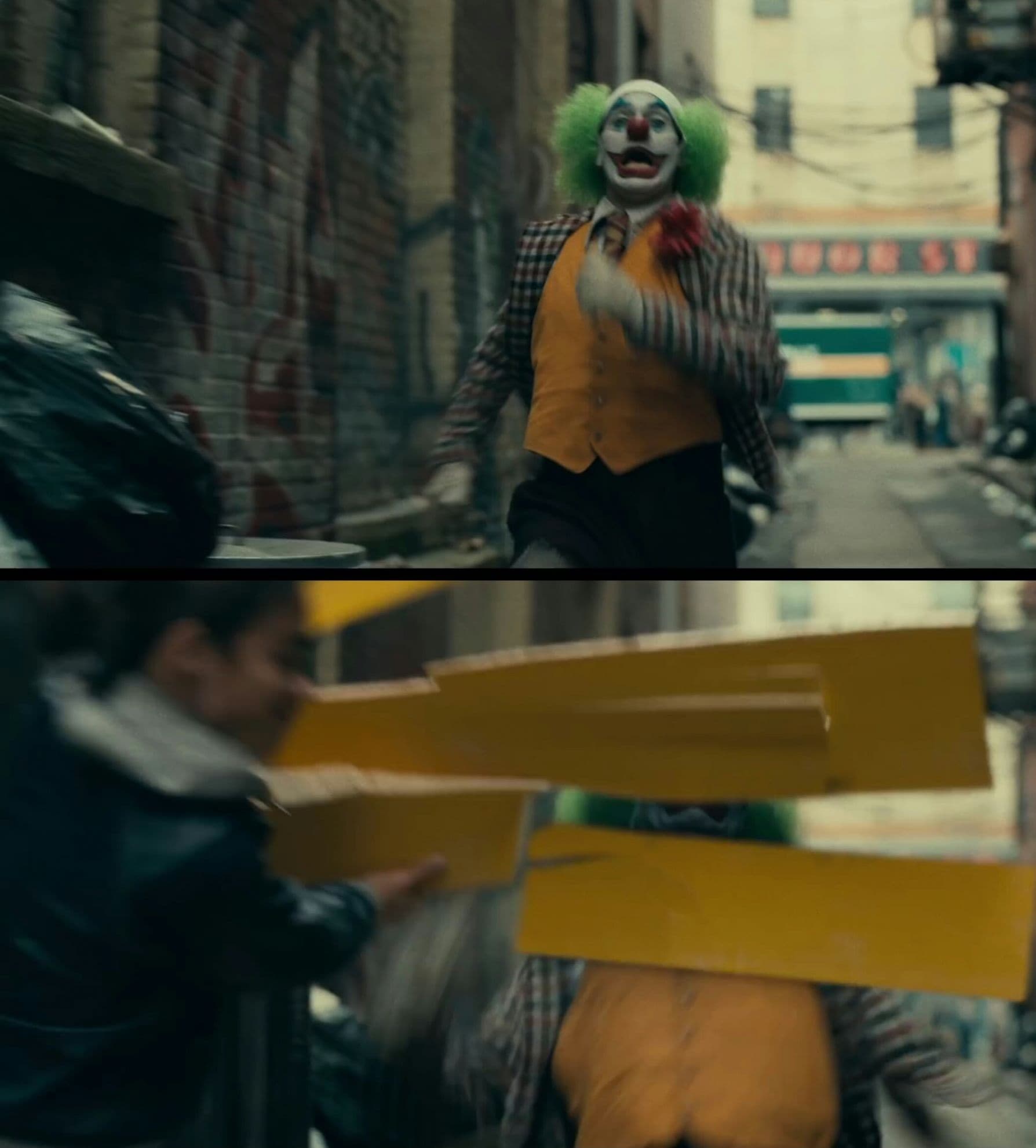 Joker running with sign