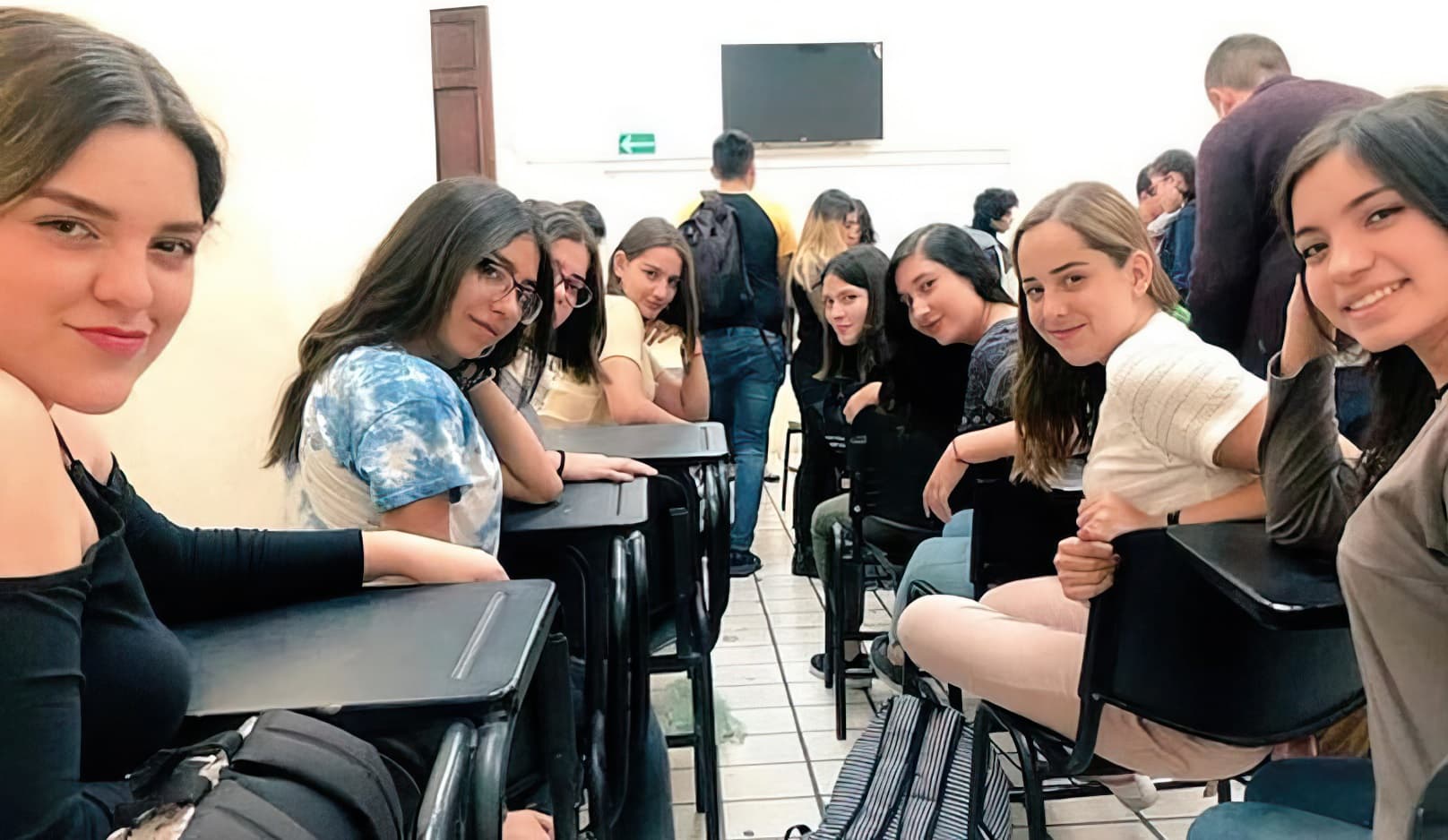 Girls in class staring