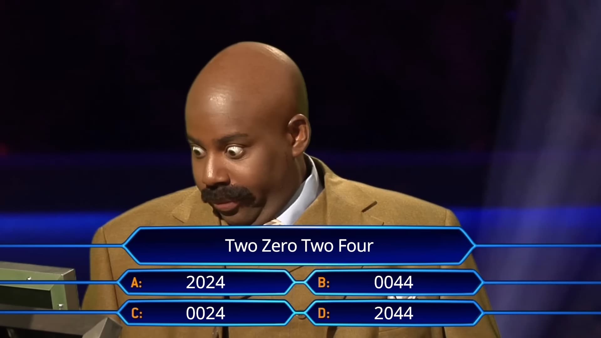 Steve Harvey looking down