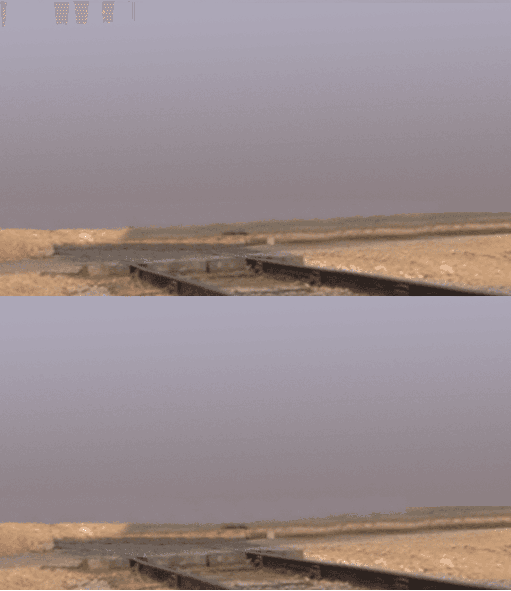 Train tracks empty field